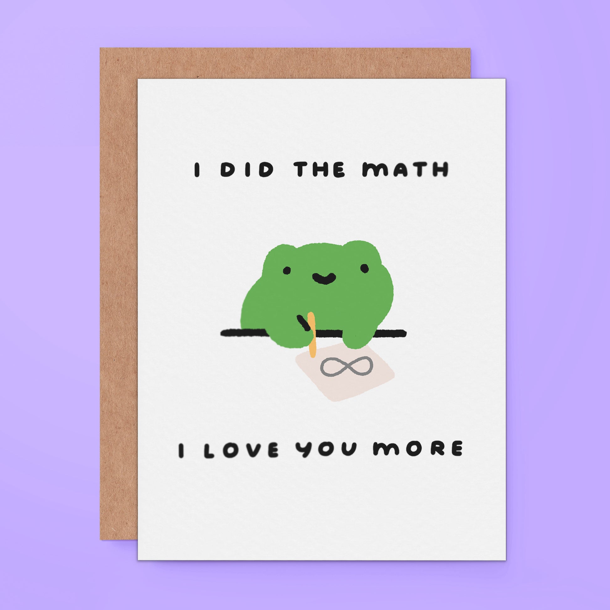 Cute greeting card with a smiling green frog holding a pencil and paper with an infinity symbol, text reads “I did the math, I love you more.”