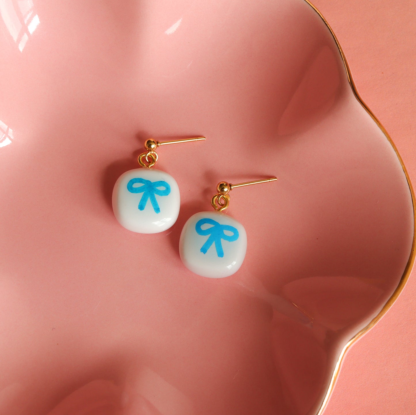 Cute handmade charm earrings with bow design