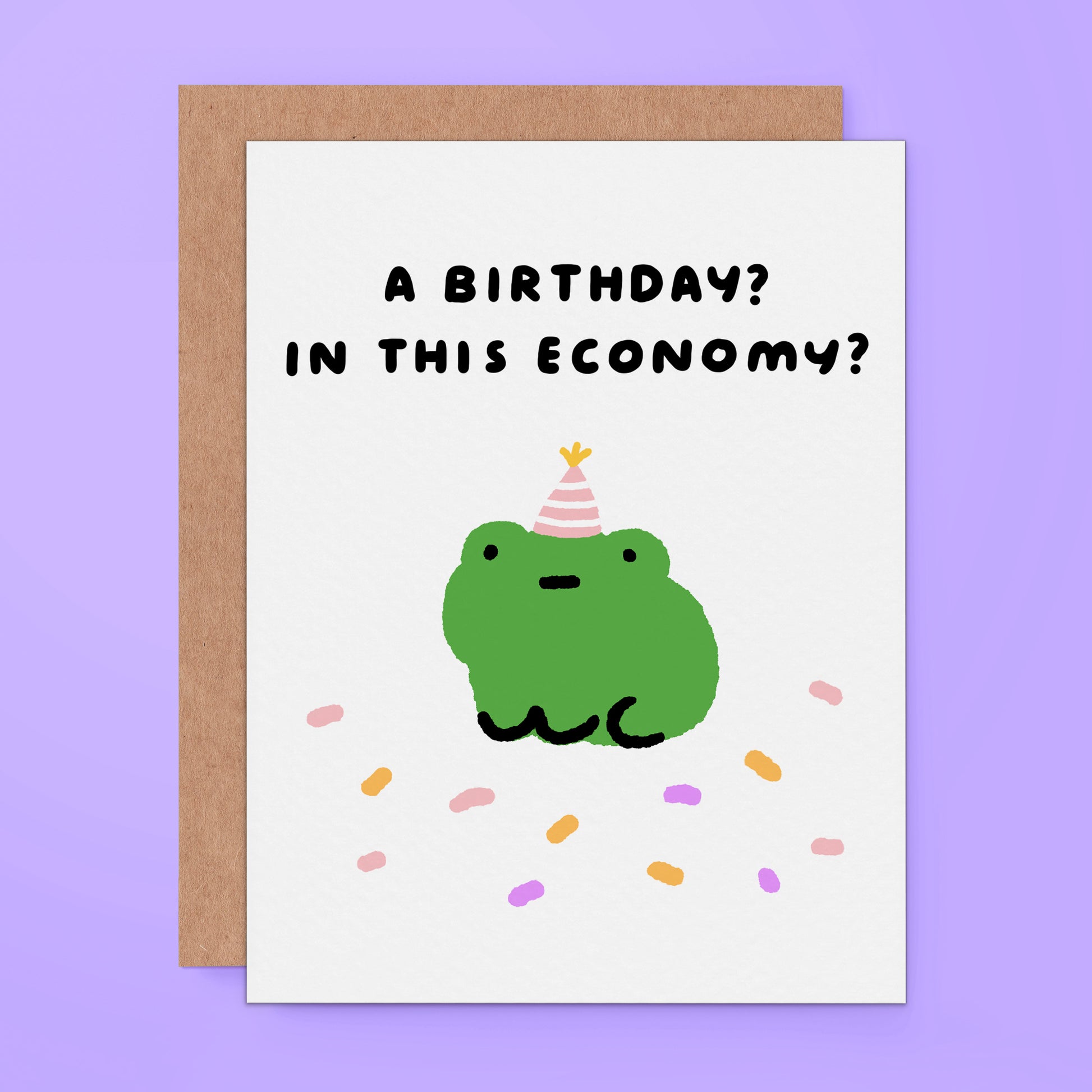 Funny birthday card with a frog in a party hat, surrounded by confetti, and the text “A birthday? In this economy?”