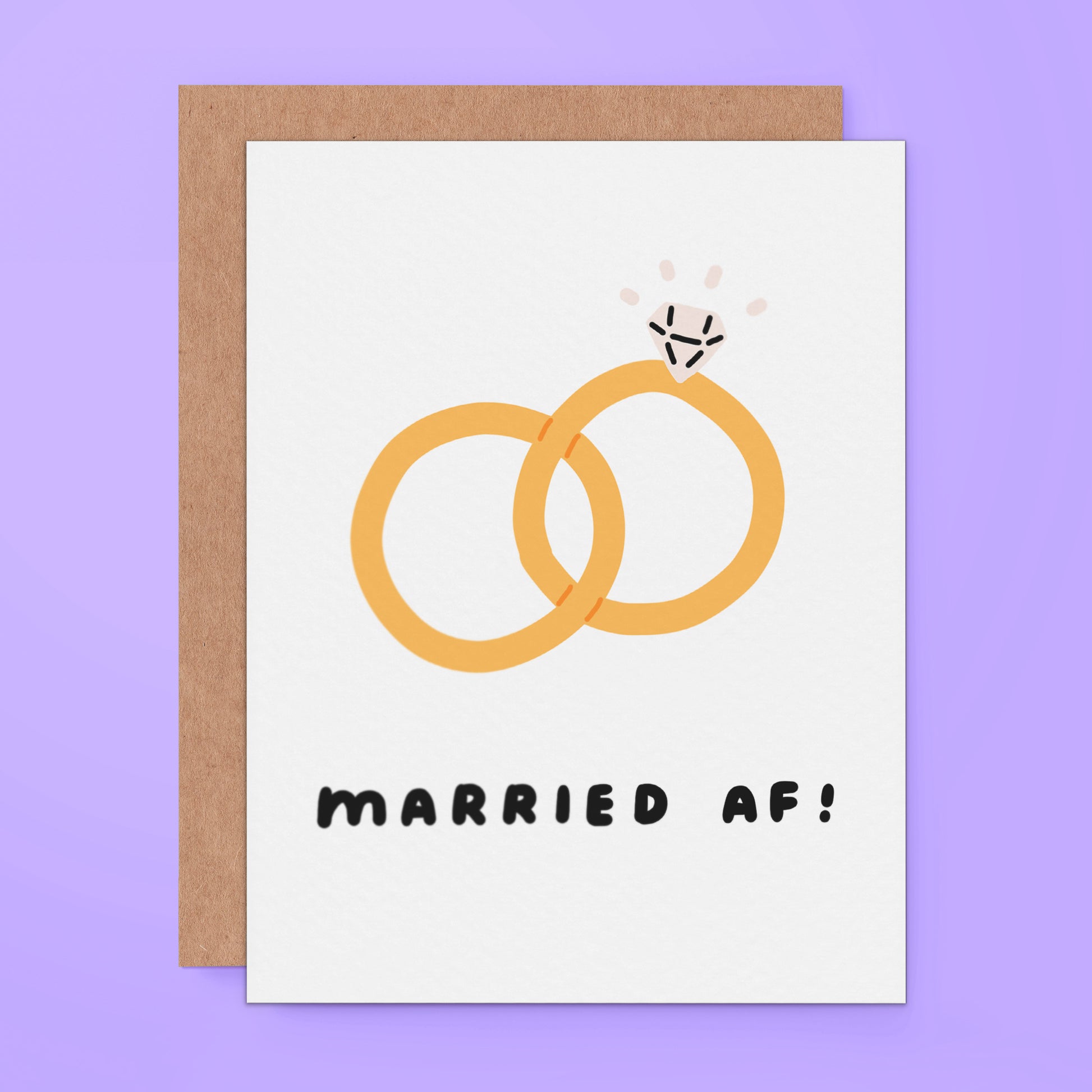 A greeting card with a graphic of two intertwined rings and the text 'MARRIED AF!' underneath.
