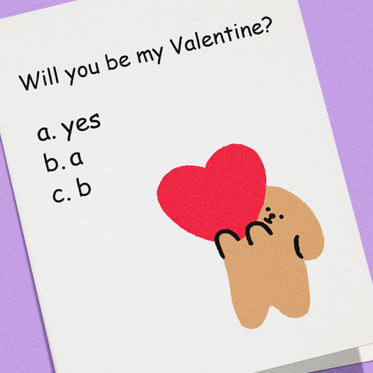 Funny Valentine’s Day card that says “Will you be my Valentine?” with multiple choice answers and a cute character holding a heart.